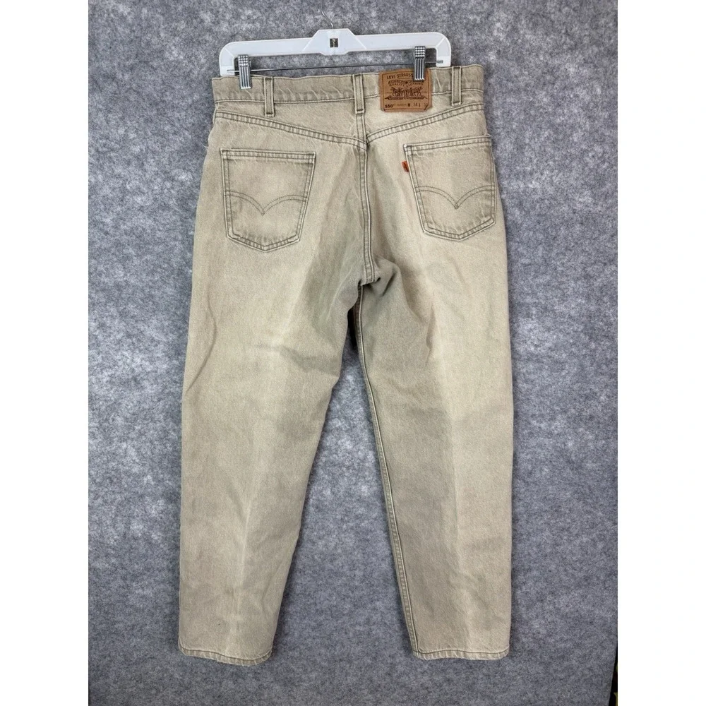 Vintage Levis 550 Relaxed Fit Mens Cream Jeans 34 Made In USA Orange Tab